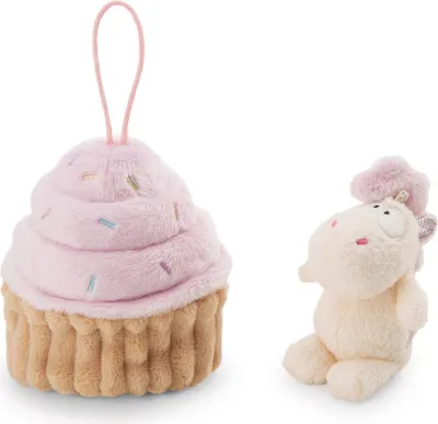 A plush cupcake toy and a plush unicorn toy are shown against a white background.