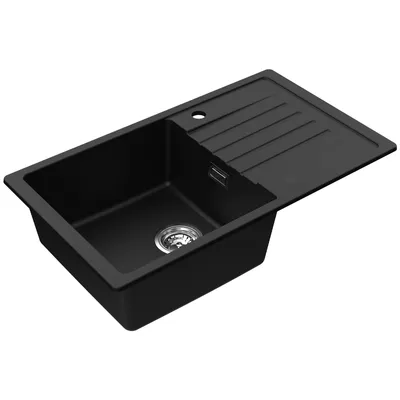 A black kitchen sink with a drainboard, shown from a slightly elevated angle against a white background.