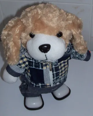 Immagine prodotto di Cane di peluche con cappuccio Peluche con movimento e suono (musica) circa 27x14x15 cm