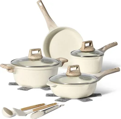 A set of beige granite cookware with wooden handles and glass lids, arranged on a white background. Several pieces are shown, including pots, pans, and cooking utensils.