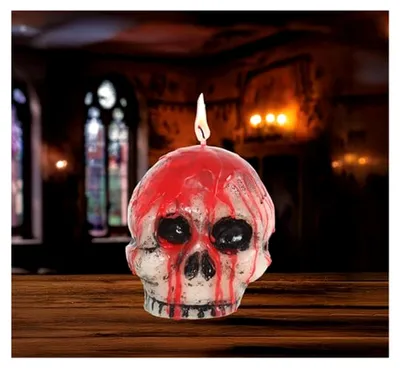 Produktbild von Guirca Halloween Totenkopfkerze 10 cm, bunt, Einheitsgröße