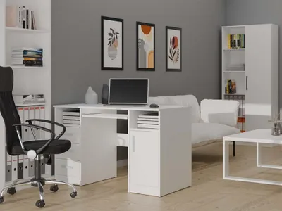 A white desk with a laptop and office chair in a room with grey walls and a white sofa.