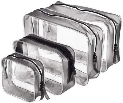 Obrázok produktu pre Ibenzoa® Priehľadná cestovná kozmetická sada pozostávajúca zo 4 kusov, vyrobená z priehľadného PVC, vodotesné cestovné tašky, rozmery: 23×16×7,5 / 20×13,5×6 / 17×12×6 / 11×10,5×4,5 cm – vhodné na kozmetiku a toaletné potreby