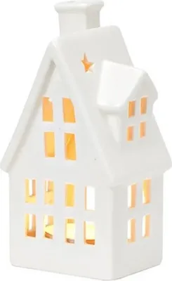 Ein kleines, weißes Porzellanhaus. Einfach gestaltet, mit ausgeschnittenen Fenstern und einem Stern.