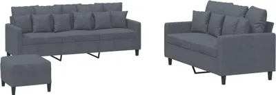 A dark gray velvet sofa set with cushions and an ottoman, displayed on a white background.