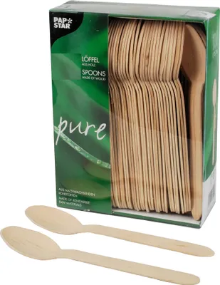 A box of wooden spoons with two spoons in the foreground.