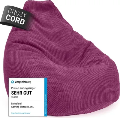 A close-up of a purple corduroy beanbag chair with marketing labels.
