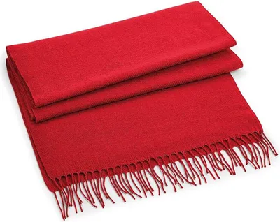 A folded red scarf with fringe on a white background.