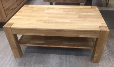 Produktbild von Couchtisch mit Ablage 65x105x46cm Eiche massiv 2258