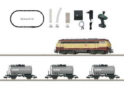 A model train set including a locomotive, three tank cars, and track components, displayed on a white background.