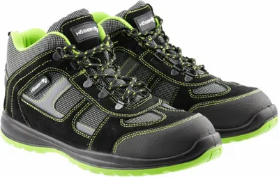 A pair of black and green work boots shown from a three-quarter angle against a white background.