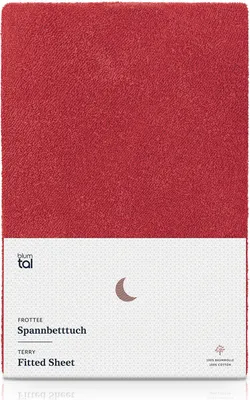A red fitted sheet is shown flat against a white background, with product information printed on a white label at the bottom.