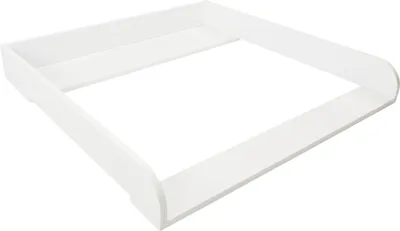 A white wooden changing table attachment for a dresser.