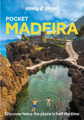 A travel guide cover showing a scenic view of Madeira with two people swimming in a natural pool.