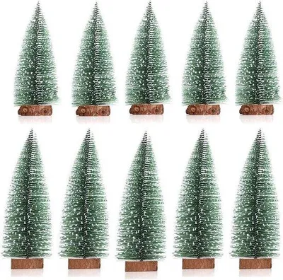 Image de Petits sapins de Noël en bois avec décoration effet neige