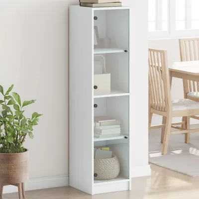 A white highboard with glass doors is shown in a room, next to a dining table and chairs.