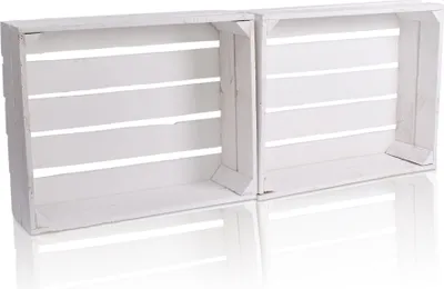 Two white wooden crates are placed side-by-side on a reflective white surface.