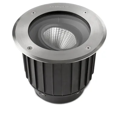 A single in-ground spotlight with a brushed metal rim and a black ribbed body.