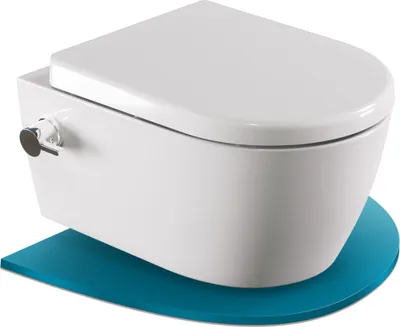 A white wall-mounted toilet with a bidet function, shown from a front-side angle on a blue mat.