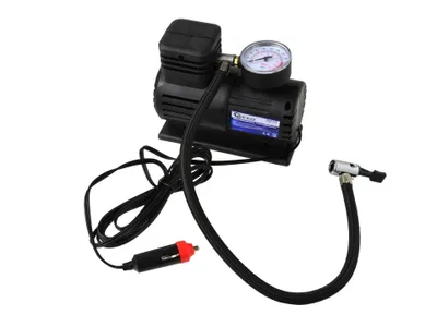 A black mini air compressor with a pressure gauge, hose, and car adapter, isolated on a white background.