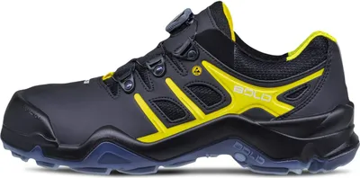A side view of a black and yellow safety shoe.
