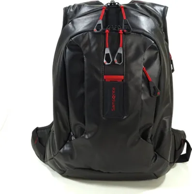 A black Samsonite backpack with red accents is shown against a white background.
