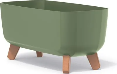 A green planter with wooden legs on a white background.