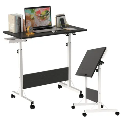 Two adjustable height desks with wheels are shown against a white background. One desk is set up with a laptop, books, and a clock. The other desk is tilted and appears to be a drawing or drafting table.
