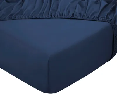 A close-up view of a dark blue fitted sheet.