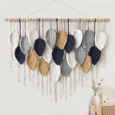 Produktbild von Unyqoos® Boho Macramé Wandbehang – großes, handgewebtes Wandteppich mit Blattmotiven und handgemachten Quasten, 100 x 72 cm, mit 3 teilbaren Holzstäben