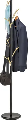 A coat rack with a jacket, scarf, and bag on it.