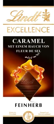 A close-up of a Lindt Excellence chocolate bar with caramel sauce.