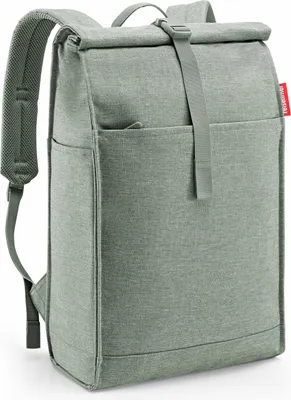 A studio shot of a gray and green backpack.