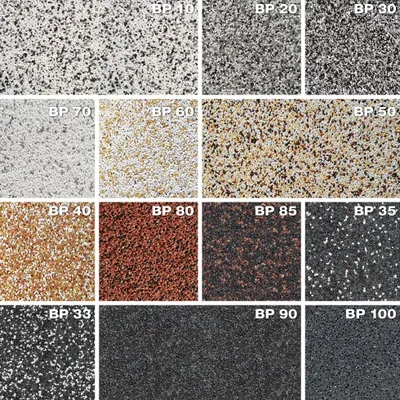 A collage of different colored textured plaster samples, each labeled with a code.