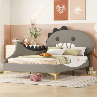 A child's bed with a dinosaur-shaped headboard in a bedroom setting.