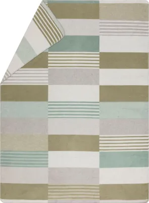 A folded blanket with a striped and checkered pattern.
