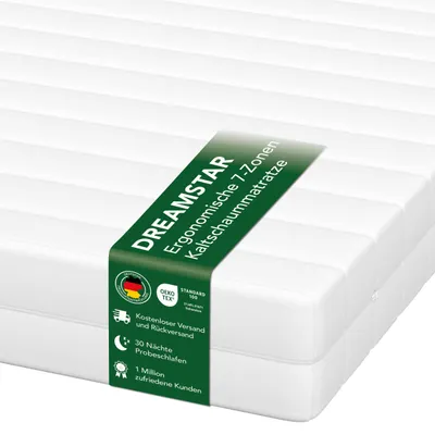 A white mattress with a green band displaying product information.