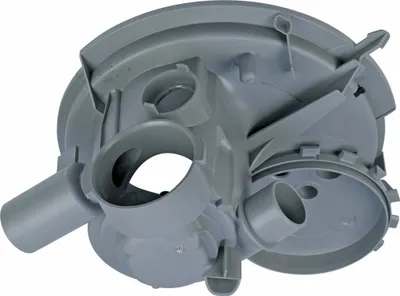 A gray plastic pump housing with multiple inlets and outlets, likely for a dishwasher.