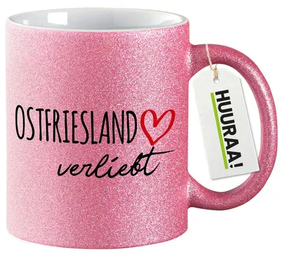Produktbild von Huuraa Glitzertasse Ostfriesland verliebt 330ml Pink Keramik Kaffeebecher Geschenkidee