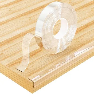 Image de Ibenzoa® : Bordure et protection d'angle transparents et auto-adhésifs pour meubles et tables – Rouleau de 10 mètres, 2 cm x 2 mm, matériau nanotechnologique, , sans résidus