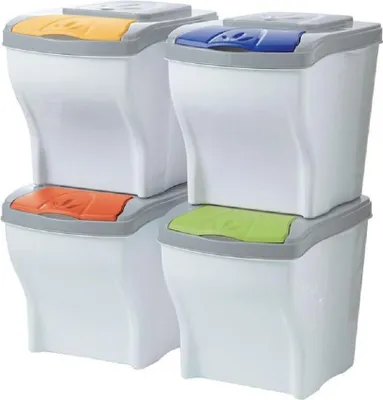 Four stacked recycling bins with different colored lids.