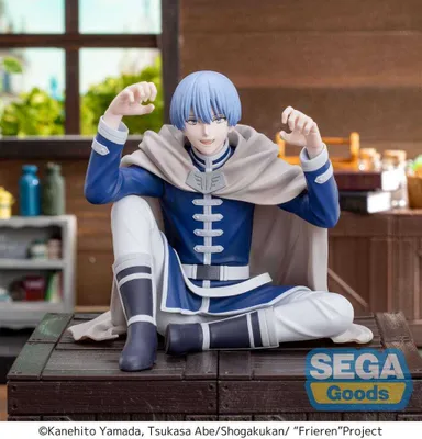 A figurine of Himmel from Frieren: Beyond Journey's End is displayed in a studio setting with props.
