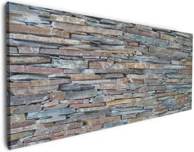 Produktbild von Wallario Premium Leinwandbild Natursteinmauer in grau braun in Größe 50 x 125 cm