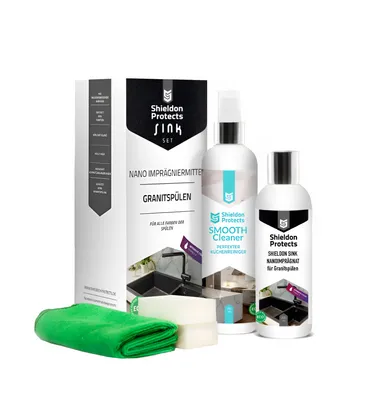 A product shot of a sink cleaning and protection set, including bottles, sponges, and a cloth.