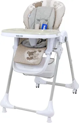 A baby high chair with a teddy bear pattern.