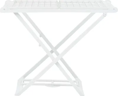 A white folding drying rack against a white background.