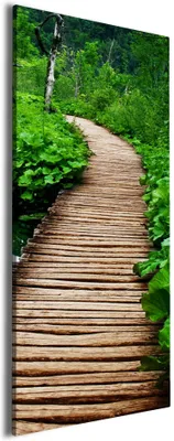 Produktbild von Wallario Premium Leinwandbild Holzweg im Wald in Größe 50 x 125 cm