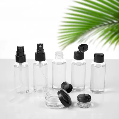 Produktbild von Transparente Kosmetiktasche mit Reiseflaschenset - 1 Liter - Kosmetiktasche für den Transport von Flüssigkeiten im Handgepäck, Schwarz - transparent