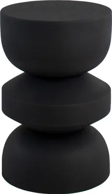 A black, hourglass-shaped side table.