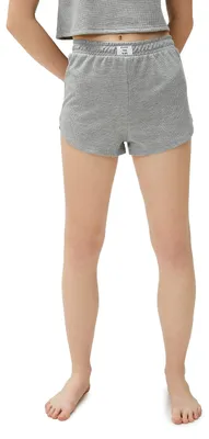 Immagine prodotto di Pantaloni corti da pigiama da donna Koton, con elastico in vita e dettagli caratteristici